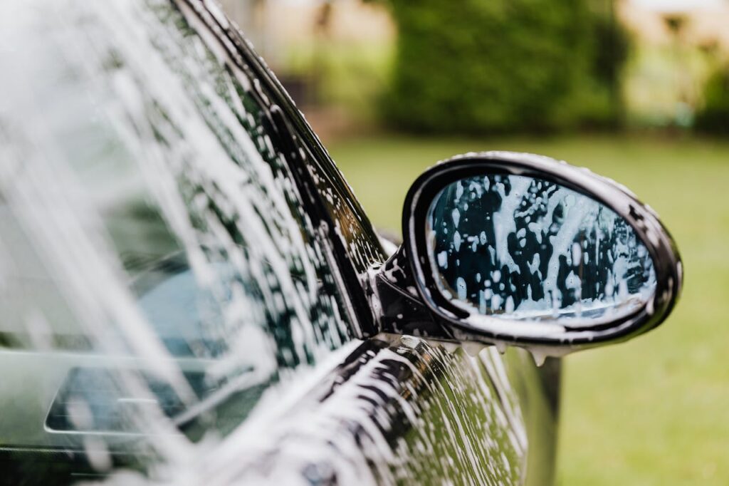 A Close-Up Shot of a Car being Washed